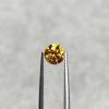 0.64 Ct Fancy Brownish Yellow/I1 Round Diamond