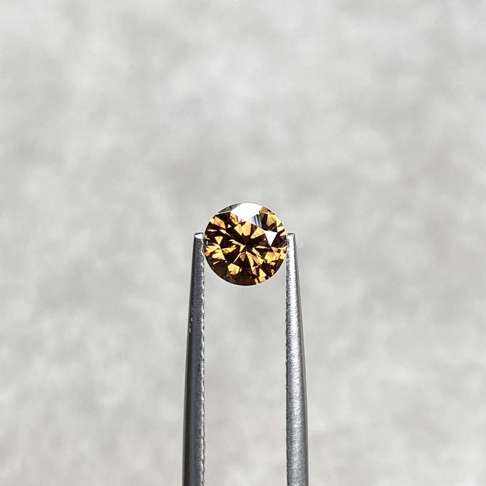 0.67 Ct Fancy Cognac/Si2 Round Brilliant Diamond