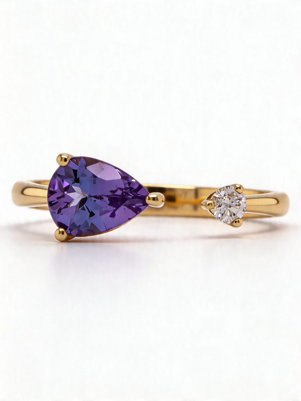 18K Yellow Gold Tanzanite and Diamond Ring