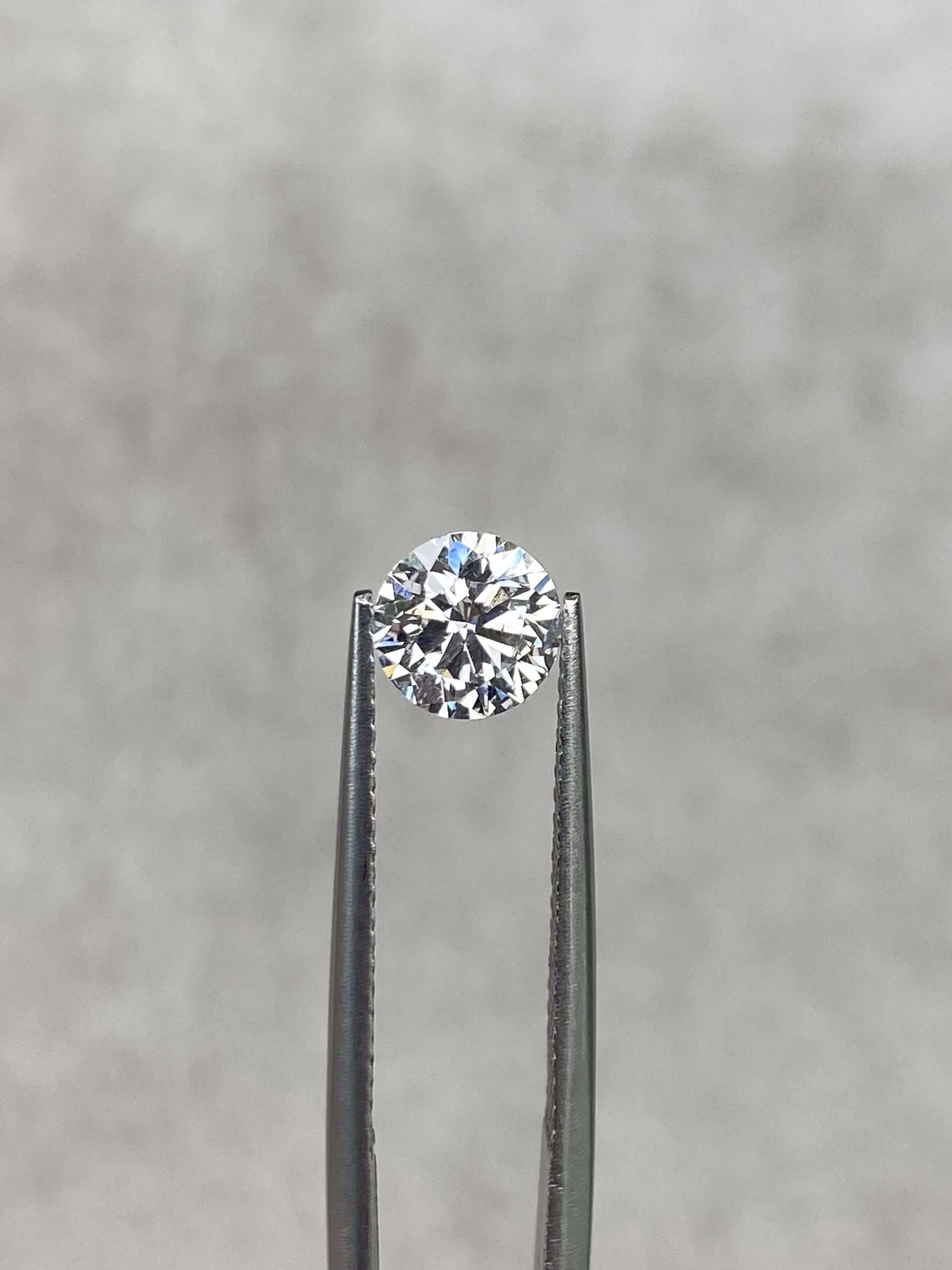 0.91 Ct Round Brilliant Cut G/SI1 Natural Diamond (DIA Certified)